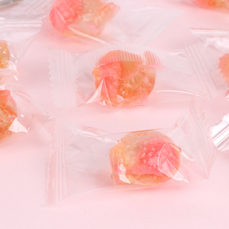 廠家直銷 白桃味水晶軟糖 爆漿糖果 零食現(xiàn)貨批發(fā) 可貼 可代.jpg